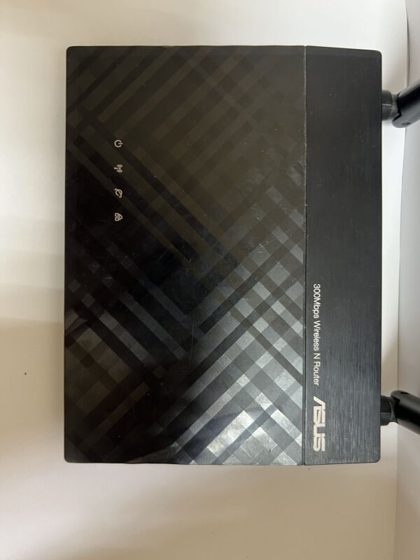 Маршрутизатор Asus RT-N12E WiFi4 / N300 / точка доступу / повторювач - Б/В - Фото №8