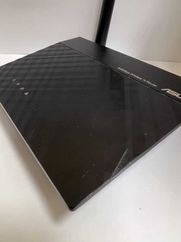 Маршрутизатор Asus RT-N12E WiFi4 / N300 / точка доступу / повторювач - Б/В - Фото №5