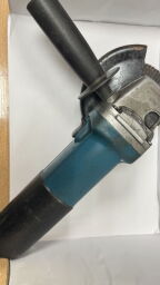Кутова шліфувальна машина Makita 9558HNRG - Б/В від виробника Makita